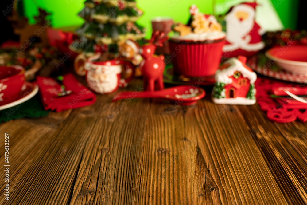 Christmas background. Christmas tableware and decorations on rustic wooden table. Christmas background. Christmas tableware and decorations on rustic wooden table.