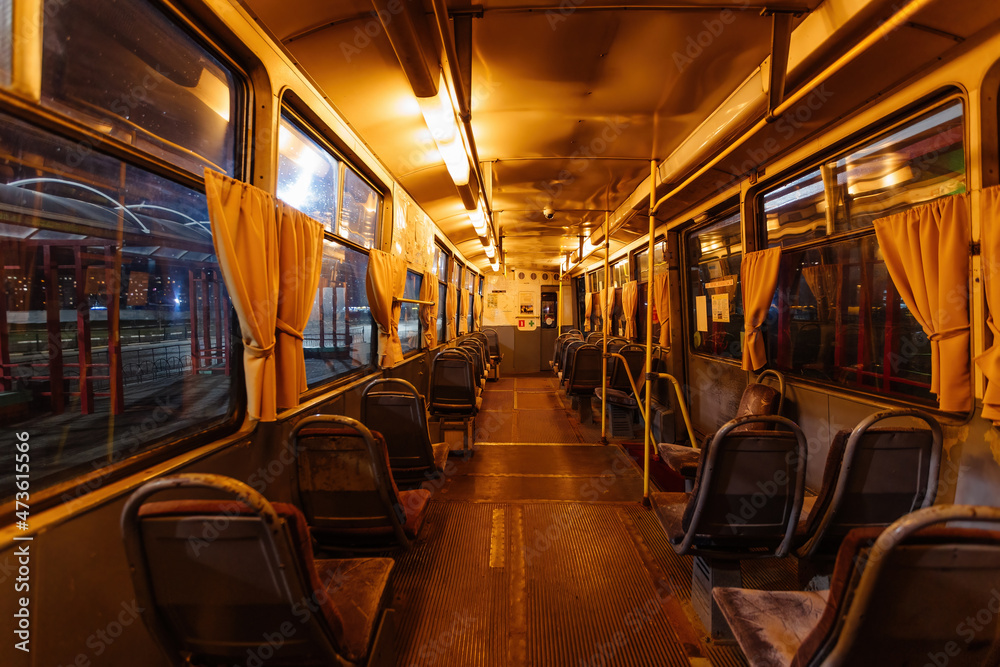 Inside of old empty Russian tram at night