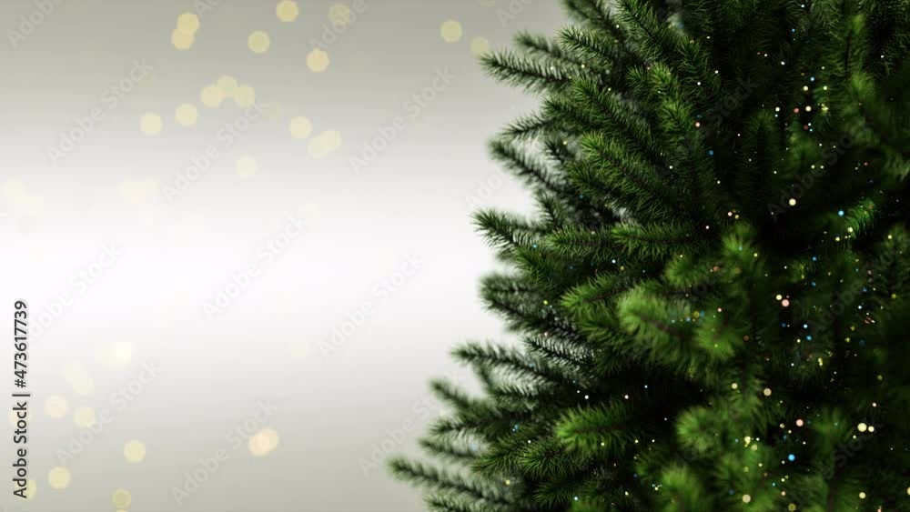 Bright Light On Christmas Tree. Blurred light decoration on Christmas tree. blinking lights twinkling on the Christmas tree.