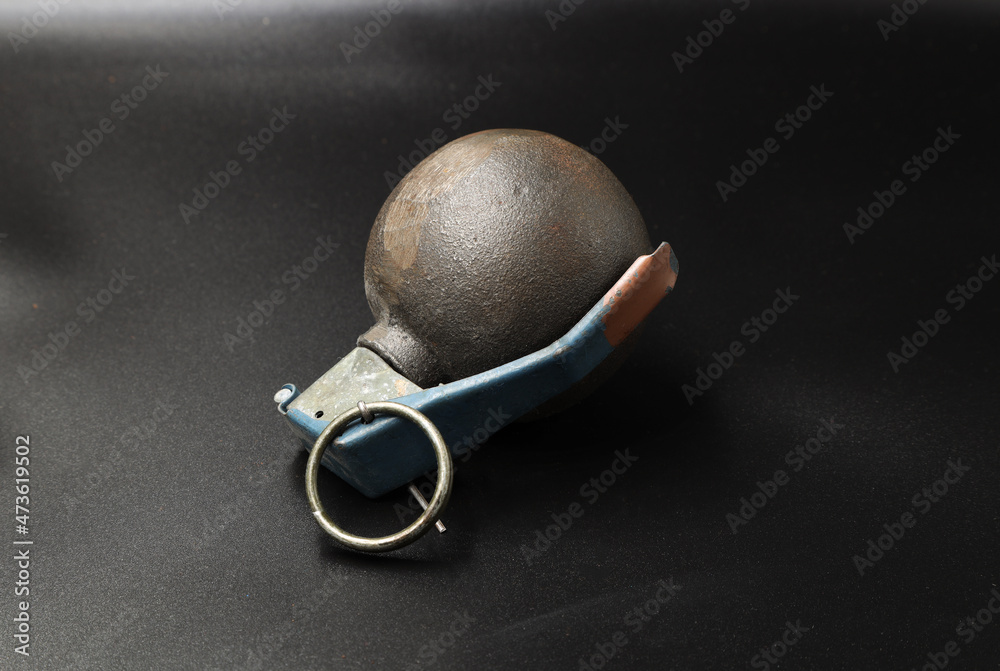 Fototapeta premium American hand grenade on black background