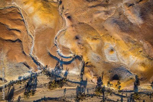 Birds eye view of Australian arid landscape from central South Australia. Aerial images over the Painted Desert, Dry Creek Beds, and scrub bushland