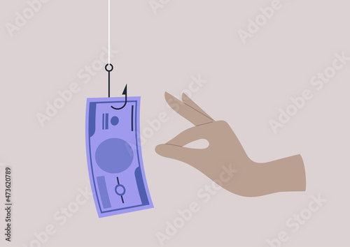 A paper banknote hanging on a hook, online scam, phishing activity