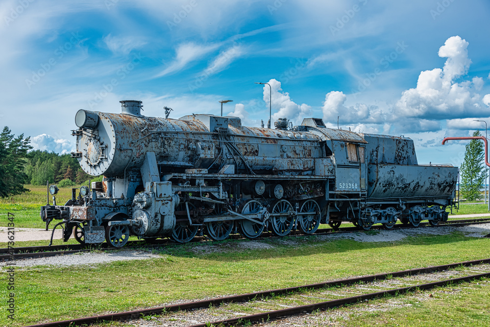 Naklejka premium Ancient steam locomotive at railway station in summer, Haapsalu, Estonia 