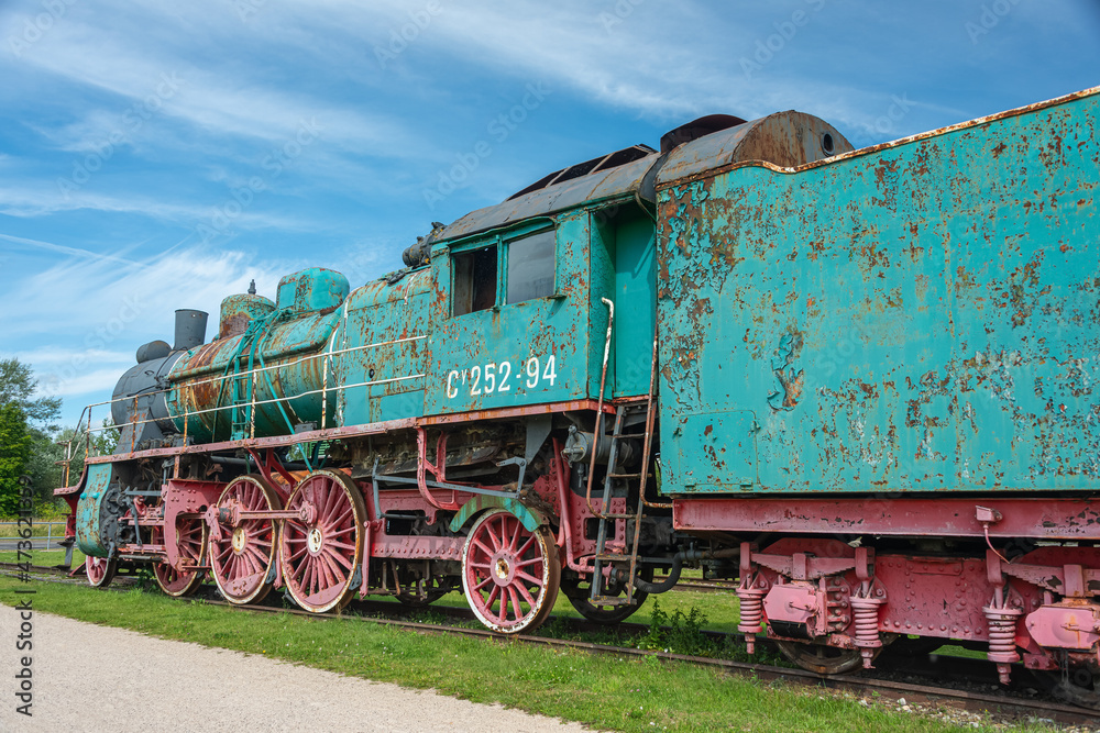 Naklejka premium Ancient steam locomotive at railway station in summer, Haapsalu, Estonia 