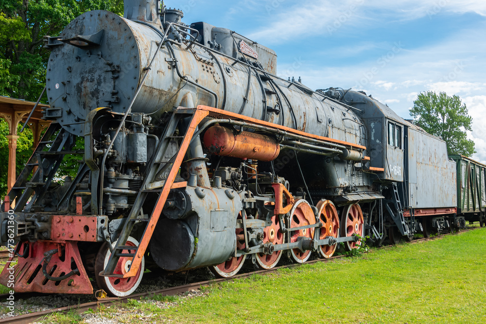 Naklejka premium Ancient steam locomotive at railway station in summer, Haapsalu, Estonia 