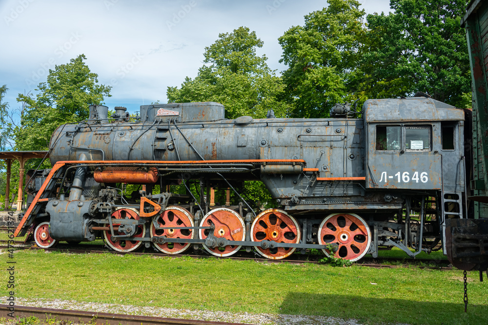 Ancient steam locomotive at railway station in summer, Haapsalu, Estonia
