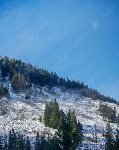 Snow Covered Mountain with Moon