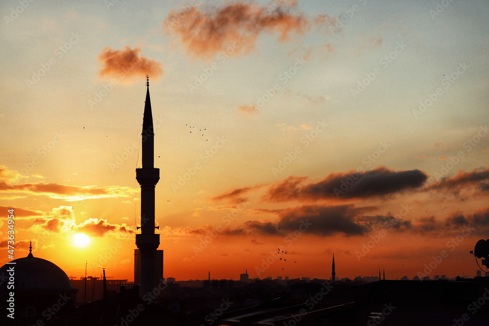 View of mosque at dramatic sunset