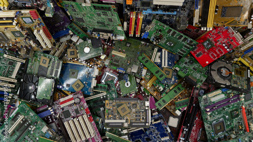 Old computer parts are ready for recycling. Computer boards in a bunch, for scrapping.
