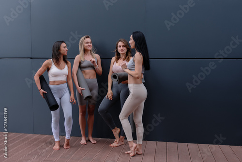 Women talking after yoga session photo