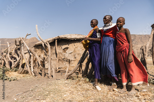 Three  woman in their maasai tribe village in Africa