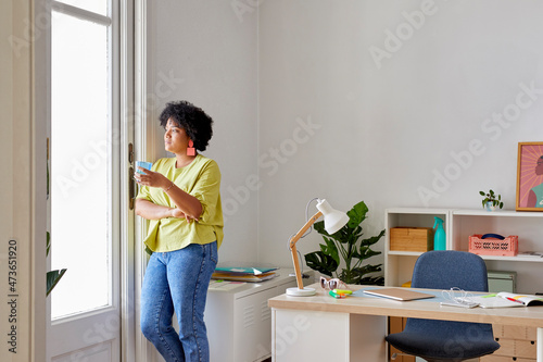 Pensive businesswoman in office photo