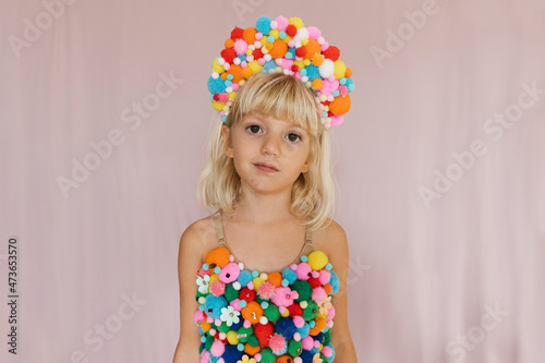 A girl in pom pom costume photo