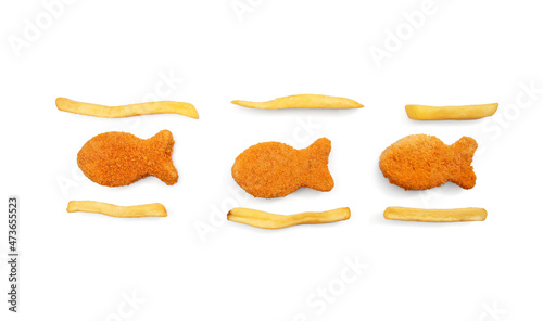 Photography Tasty fish nuggets with french fries on white background