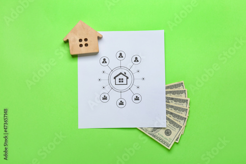 Paper sheet with wooden hou...