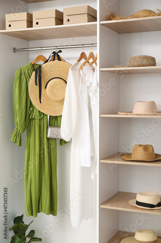 Stylish straw hats with clo...