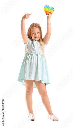 Girl pointing with finger a...