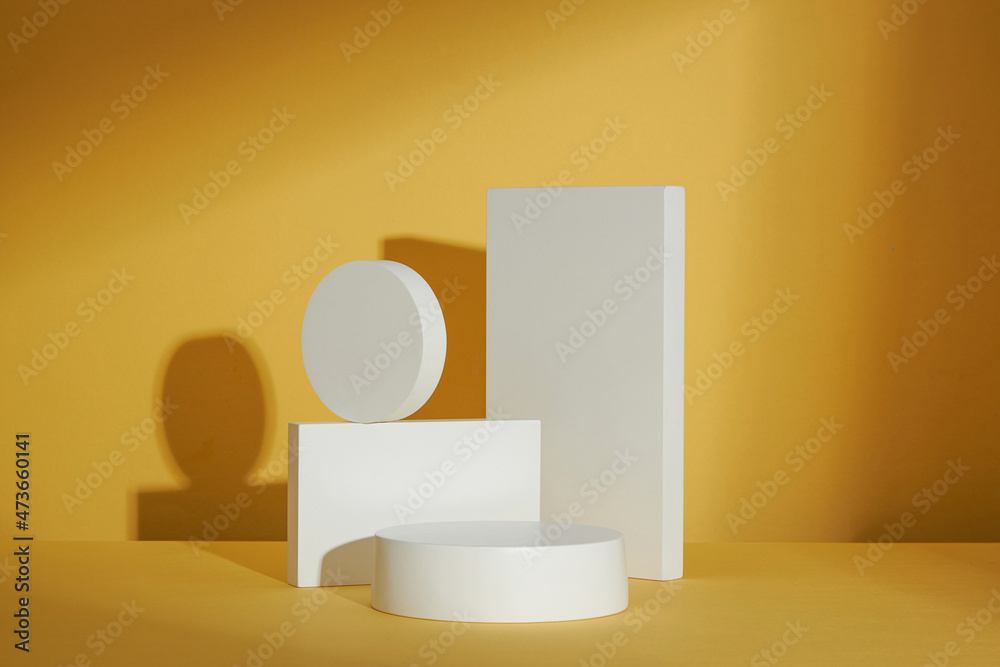 Yellow background with circle , square white podium and blank space for advertising , abstract content , front view Yellow background with circle , square white podium and blank space for advertising , abstract content , front view
