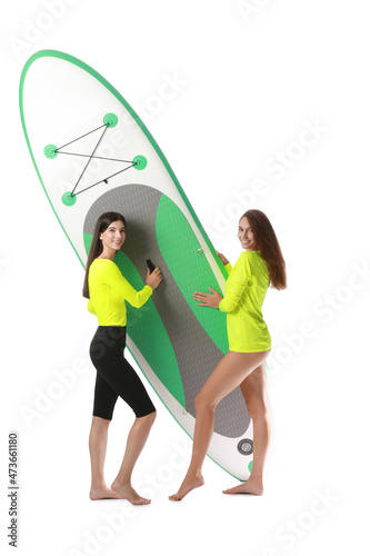 Sporty young women with boa...