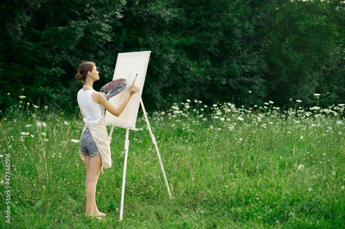 woman artist drawing landscape nature drawing creative © VICHIZH