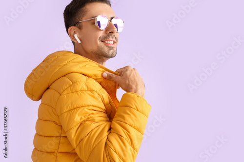 Stylish young man in sungla...