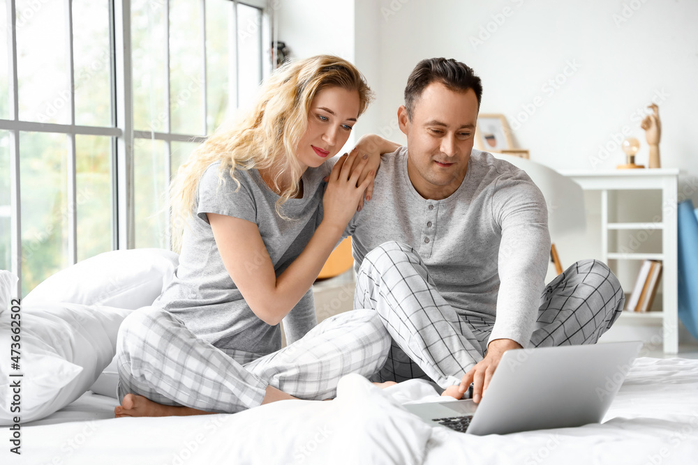 Happy couple spending time together at home Happy couple spending time together at home
