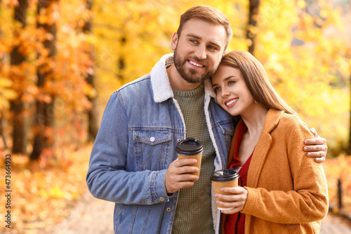 Young beautiful couple hold...
