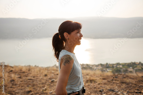 Woman outside recovering and breathing