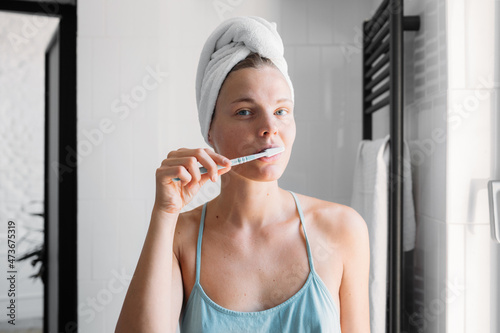 Woman Brushing Teeth  photo