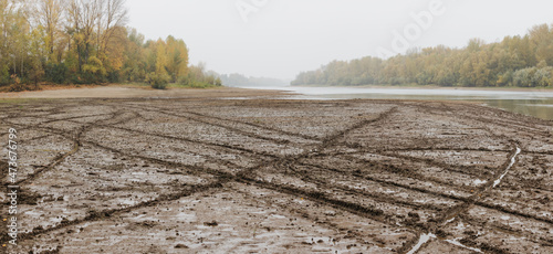 Autumn landscape with impassable mud after rain photo