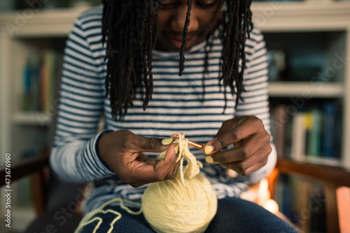 African American girl learning to crochet photo