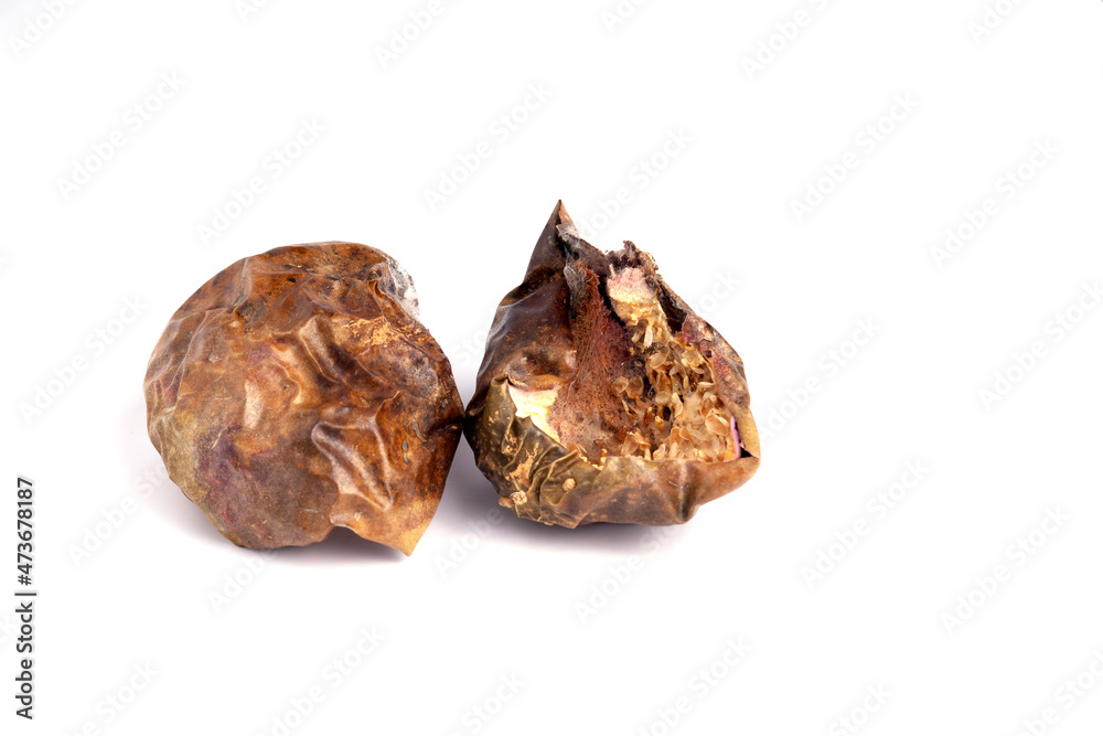 dried passion fruit peel on white backgrounds dried passion fruit peel on white backgrounds