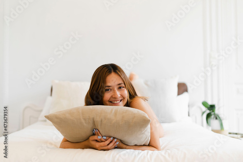 Pretty woman in bed