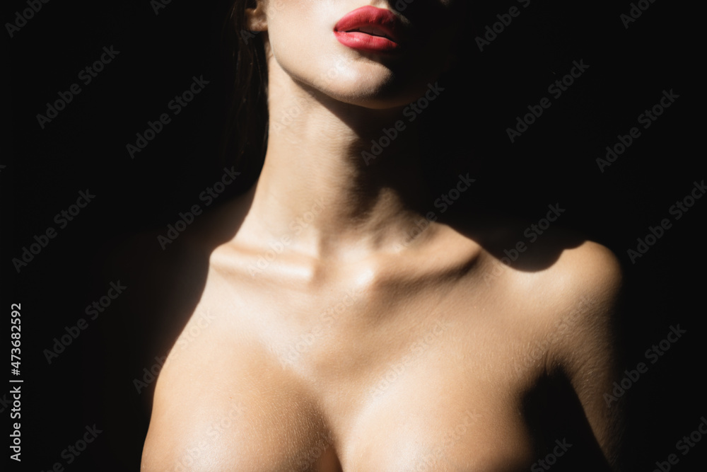 Sexy lips and tits boobs, breast. Beautiful young woman portrait on black.  Sensual face of elegant female model in studio. Elegant lady. foto de Stock  | Adobe Stock