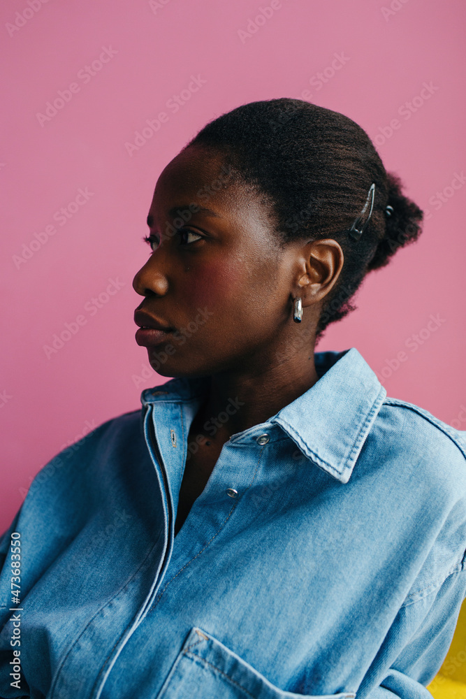 Black woman portrait pink background Black woman portrait pink background