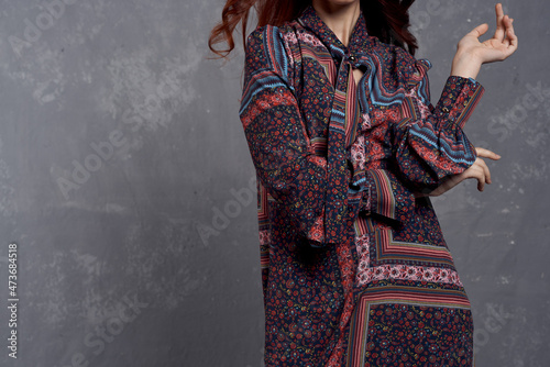 woman in coat fashionable clothes glamor red hair model