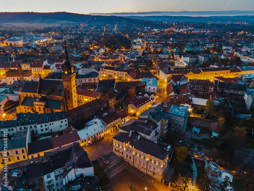 Fototapeta premium Tarnow City in Poland. Old Town Aerial Drone View at Night