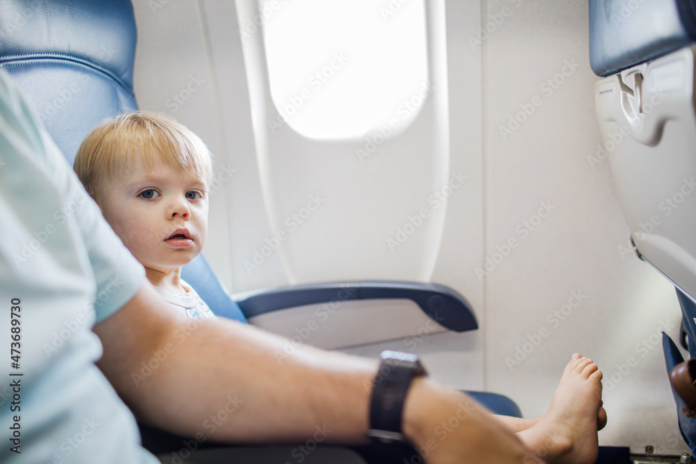 toddler on an airplane toddler on an airplane
