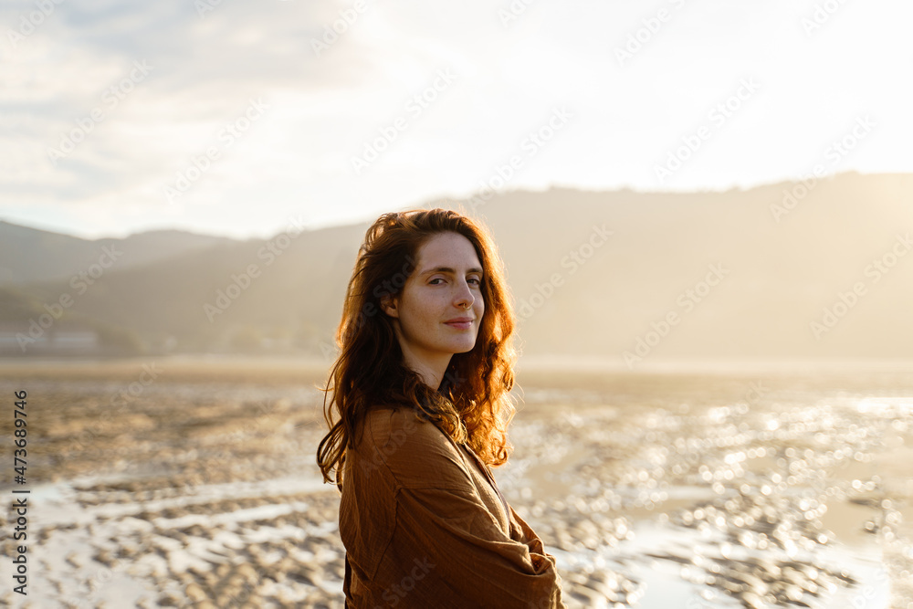 Portrait of serene woman enjoying sunset Portrait of serene woman enjoying sunset