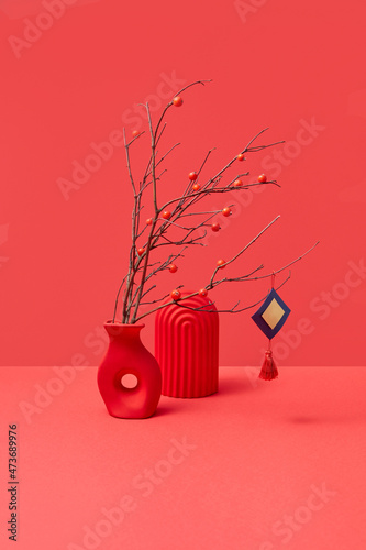 Red decoration with vase