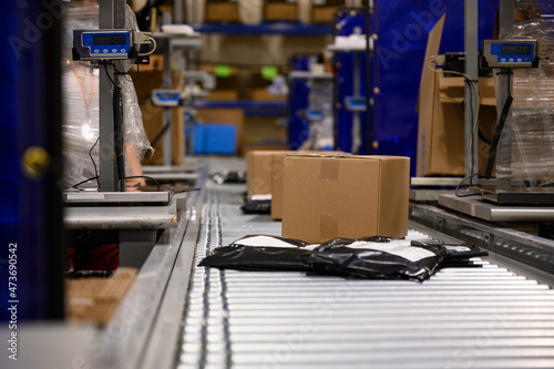 E-Commerce Warehouse with boxes being shipped  worldwide