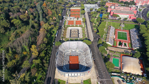 Photography Aerial drone photo of iconic Foro Italico tennis and swimming facilities, Rome,