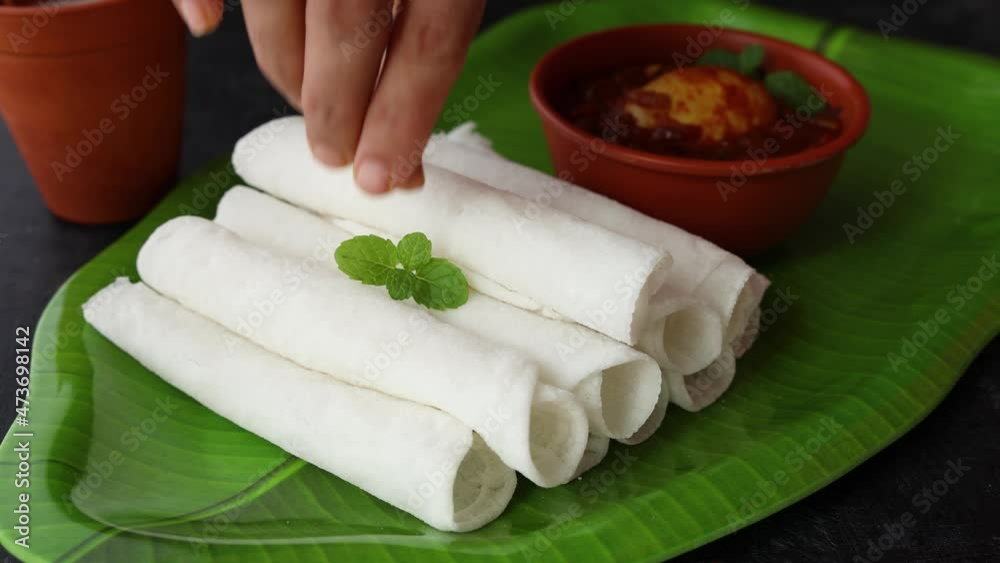 Patri Rice Roti Video Stock Rice Pathiri pathir flat bread spicy chicken curry woman ...
