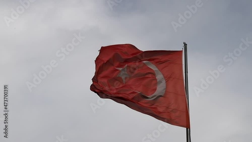 Turkish flag waving in the sky.