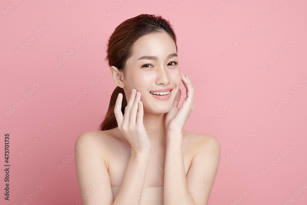Beautiful young asian woman with clean fresh skin on pink background, Face care, Facial treatment, Cosmetology, beauty and spa, Asian women portrait. Beautiful young asian woman with clean fresh skin on pink background, Face care, Facial treatment, Cosmetology, beauty and spa, Asian women portrait.