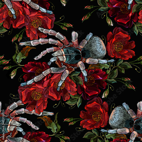 Embroidery wild red roses and tarantula spiders. Floral medieval gothic background. Seamless pattern. Fashionable esoteric template for clothes