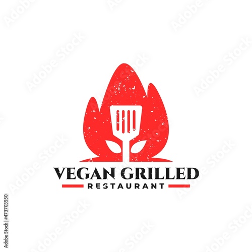 illustration of a spatula and a leaf inside of a fire, good for vegan cafe or restaurant logo