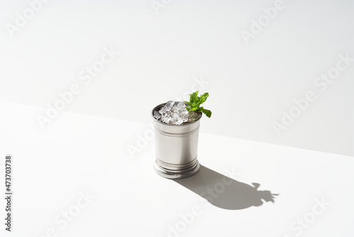 Mint julep cocktail in metal cup photo