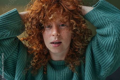 Portrait of a red haired woman.