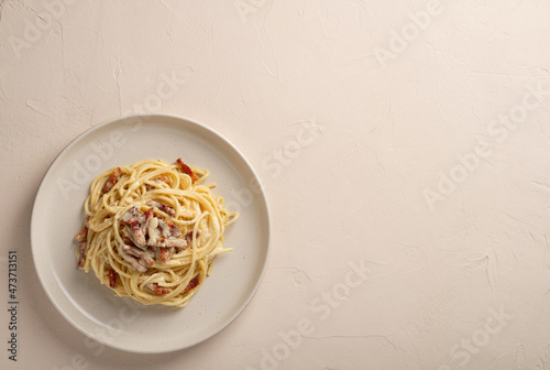Top view plate spaghetti carbonara with copy space